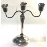 Large silver candelabra filled base measures approx 31cm tall