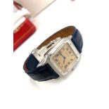 A fine and rare platinum limited edition Cartier square wristwatch complete with paper work and