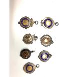 Collection of silver pocket watch chain fobs