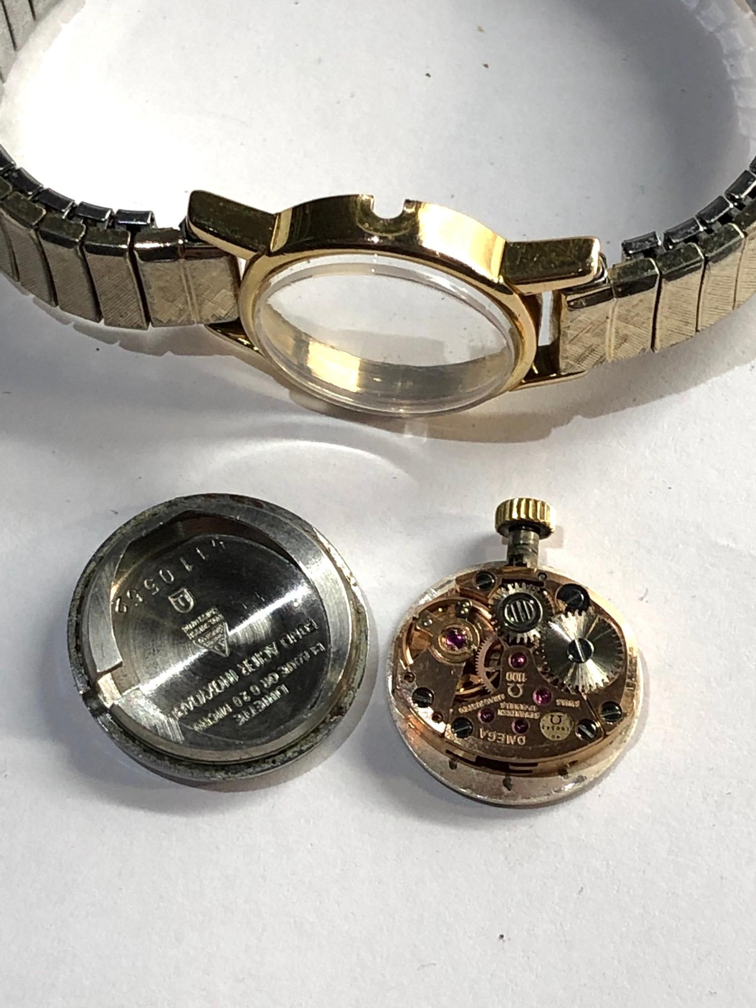 Ladies Omega deville wristwatch watch winds and ticks but no warranty given please see images for