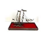 Cased silver ship