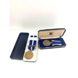 Boxed police long service medal and Kosovo medal