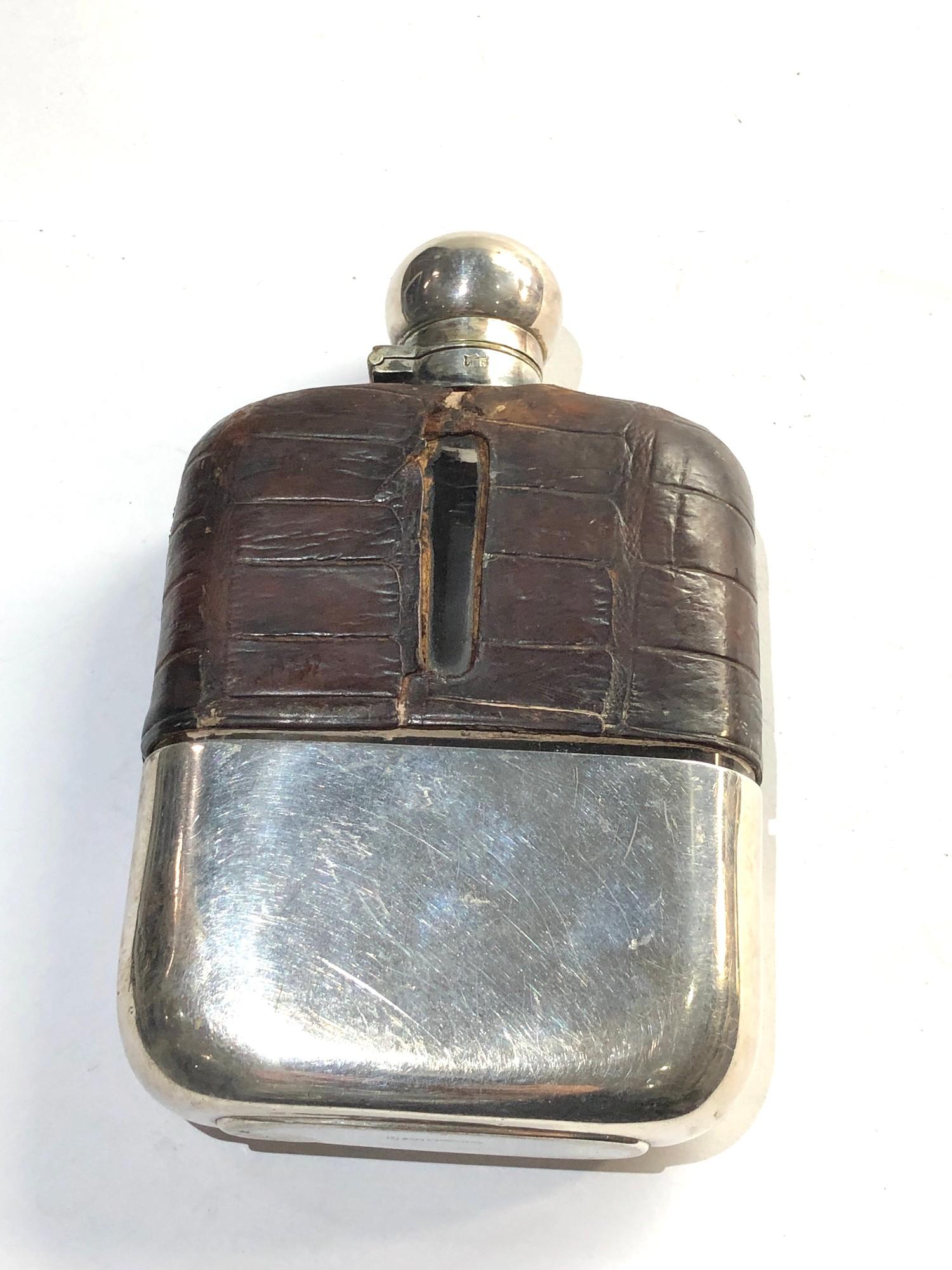 Large antique silver plated hip flask measures approx 15cm by 9cm please see images for details