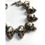 Silver skull bracelet not hallmarked but acid tested as Silver measures approx 23cm long each