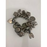 Vintage silver charm bracelet weight 70g