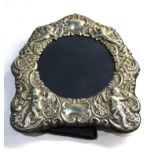 Vintage ornate silver picture frame embossed with cherubs measures approx 17cm by 15cm please see