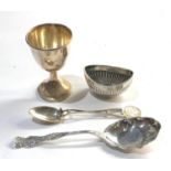 Selection of silver items includes salt egg cup and 2 spoons please see images for details