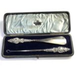 Large silver handled button hook and shoe horn in original fitted box please see images for details