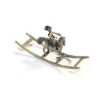 Dutch silver miniature boy on rocking horse dutch silver hallmarks please see images for details