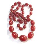 Vintage Cherry amber / bakelite bead necklace good internal streaking largest bead measures approx