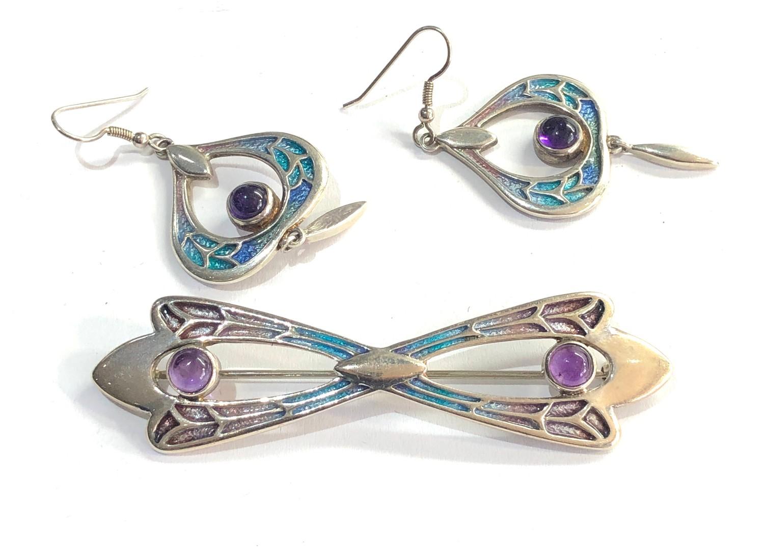 Silver and enamel amethyst set earrings and brooch