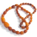 Antique egg yolk amber bead necklace weight 17g