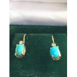 14ct gold turquoise and cz set earrings