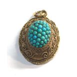 Antique 18ct gold and turquoise etruscan pendant locket 1 small stone missing measures approx 31mm