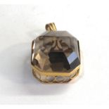 14ct smokey quartz pendant measures approx 25mm by 23mm weight 12.5g