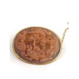 10ct gold canton carved amber scene brooch measures approx 35mm by 28mm