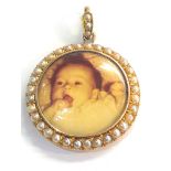 Antique 15ct gold and seed-pearl picture locket measures approx 30mm dia