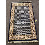 Antique rug measures approx width 37" length 62"