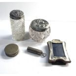 Selection of silver items includes trinket jar, a pill box, miniature frame and needle case