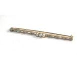 15ct gold and plat Edwardian pearl and diamond bar brooch measures approx 6.6cm long