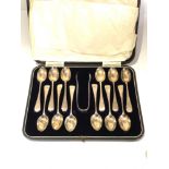 Set of 12 silver tea spoons with sugar tongues in fitted box London silver hallmarks silver weight