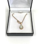 9ct gold opal cameo pendant on 9ct gold chain weight 4.84g