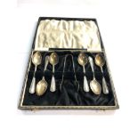 Boxed set of silver tea spoons and sugar tongues