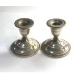 Pair of silver squat candlesticks weighted