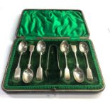 Boxed set of silver tea spoons and sugar tongues