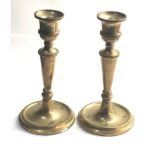 Pair of silver candlesticks Birmingham silver hallmark each measures approx 20cm tall