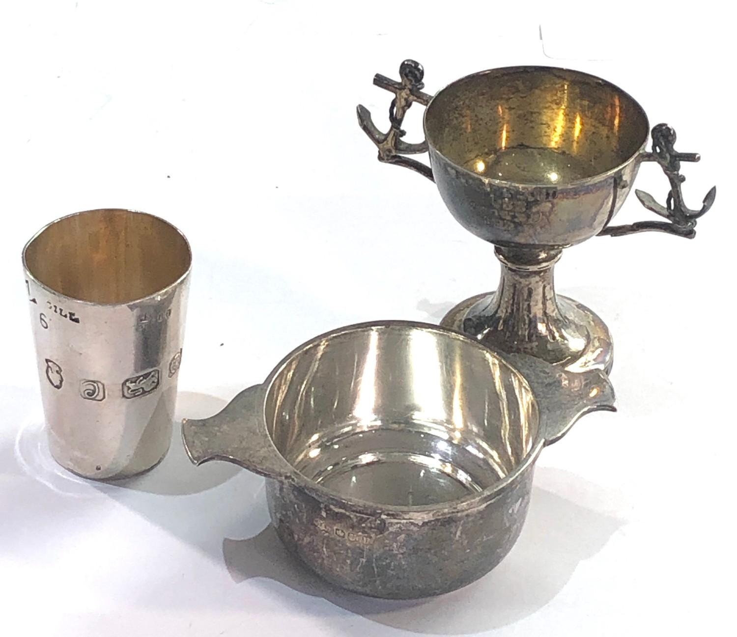 Silver items includes small wine taster bowl small trophy spirit measure