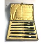 Boxed set of 6 silver blade knives