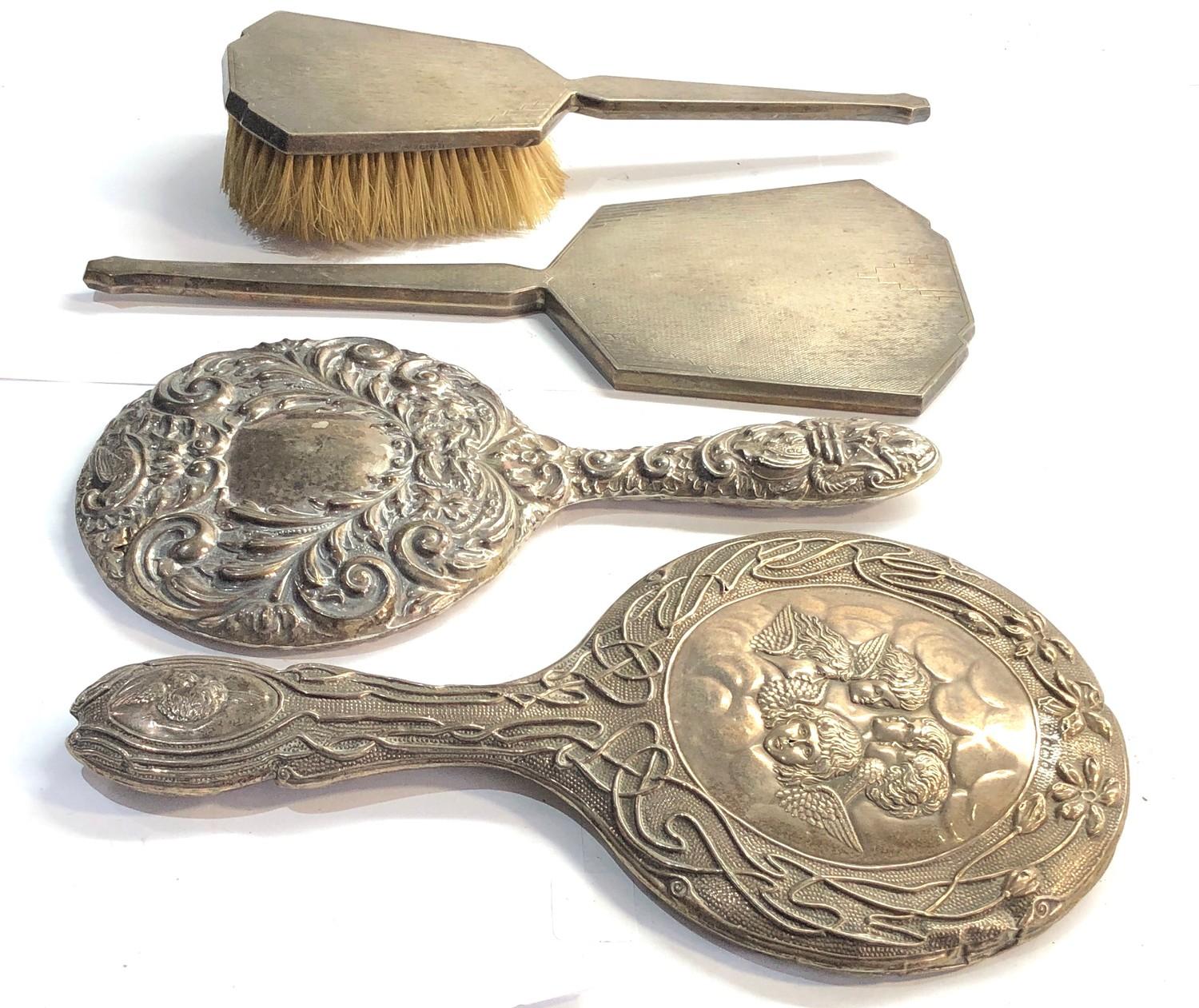 Antique silver mirrors and brushes