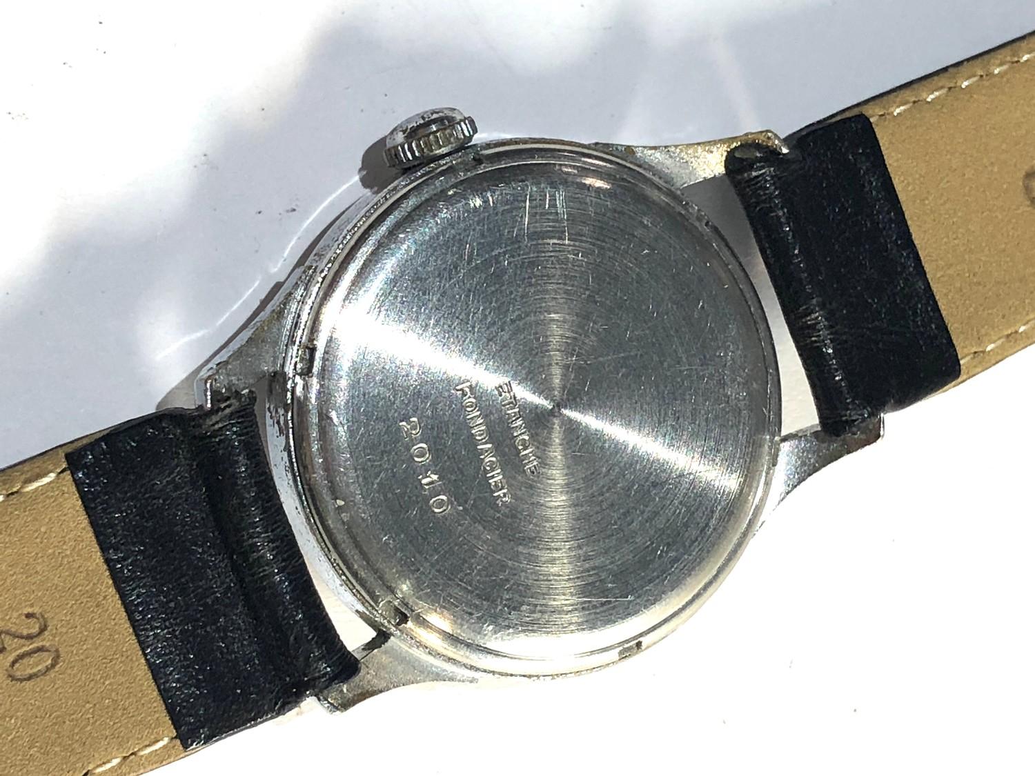 Vintage Mondia gents wristwatch winds and ticks but no warranty given - Image 4 of 4