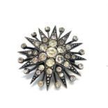 Antique silver paste starburst brooch