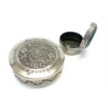 2 Persian silver boxes larget measures approx 6.3cm dia weight 90g the other set with green stone