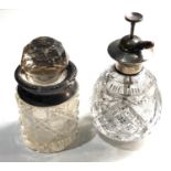 2 Silver rimmed cut glass bottles