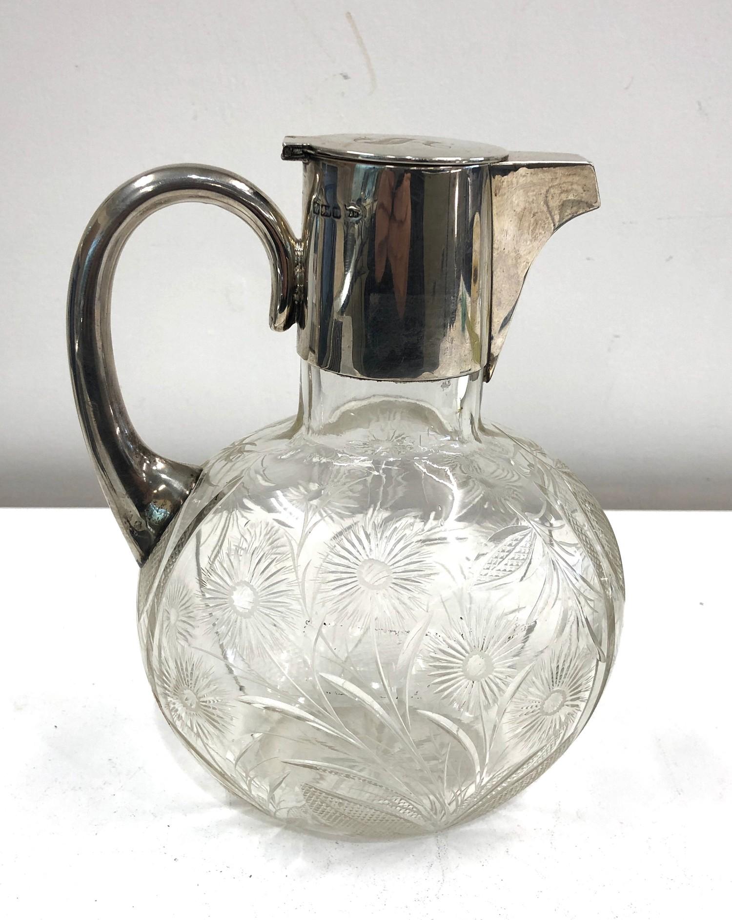 Silver and cut glass claret jug by Walker and Hall