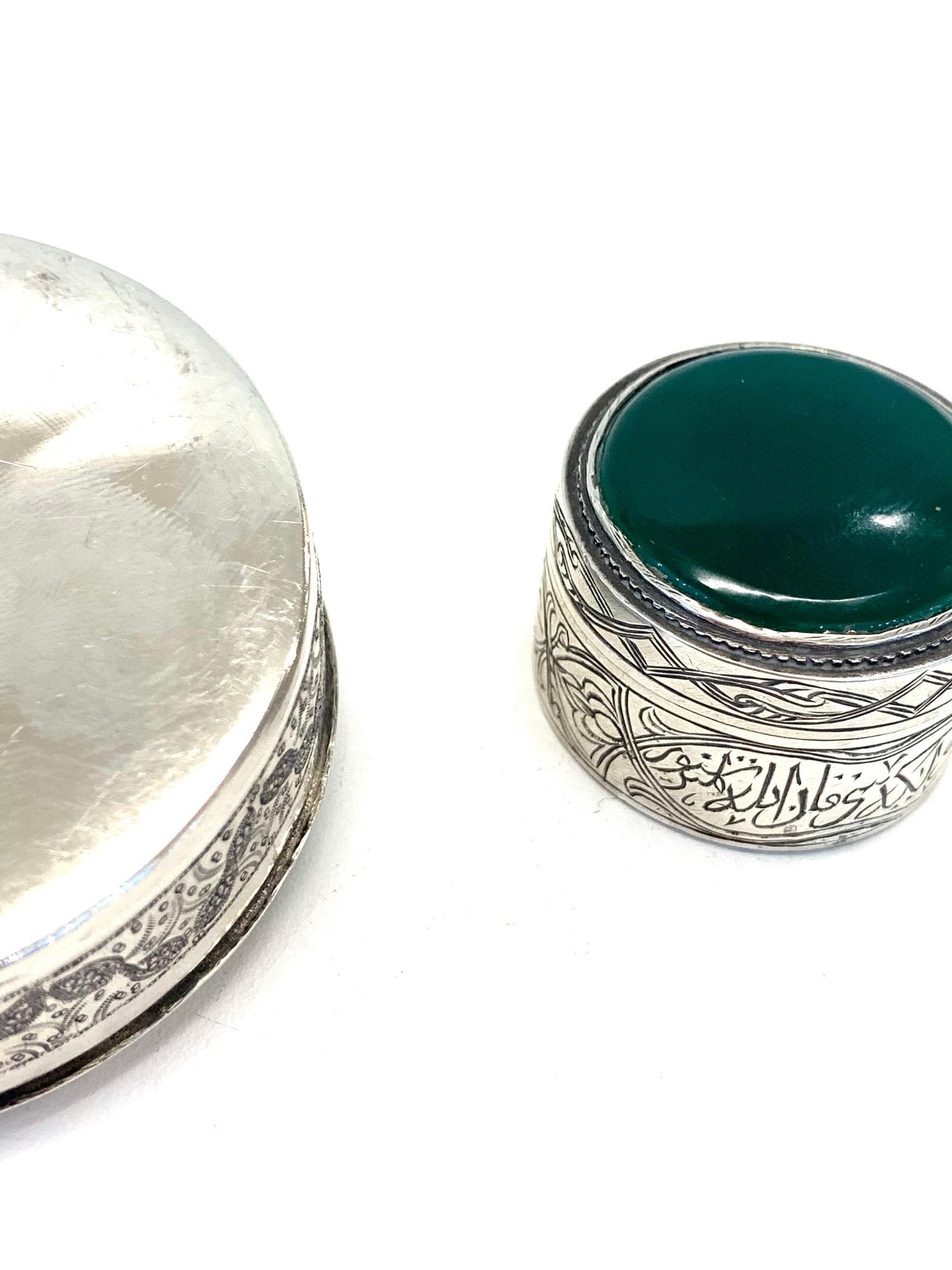 2 Persian silver boxes larget measures approx 6.3cm dia weight 90g the other set with green stone - Image 3 of 3