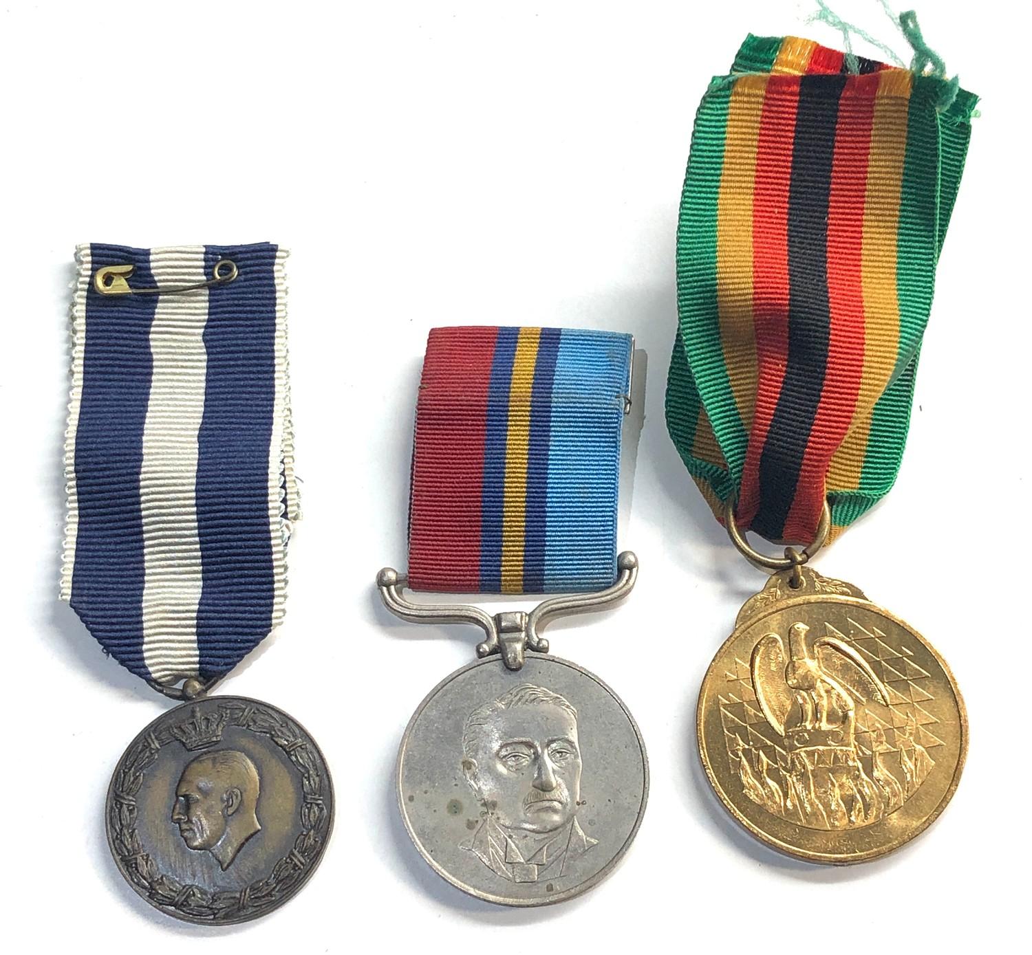 3 vintage medals inc ww2 greek ,zimbabwe rhodesia, the zimbabwe medal rim reads:25535 E R PO S G - Image 2 of 2