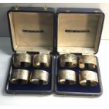 Boxed set of 8 silver serviette /napkin rings, Full Birmingham silver hallmarks, date letter X,