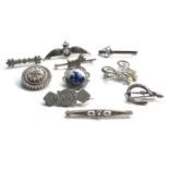 Selection of vintage silver brooches