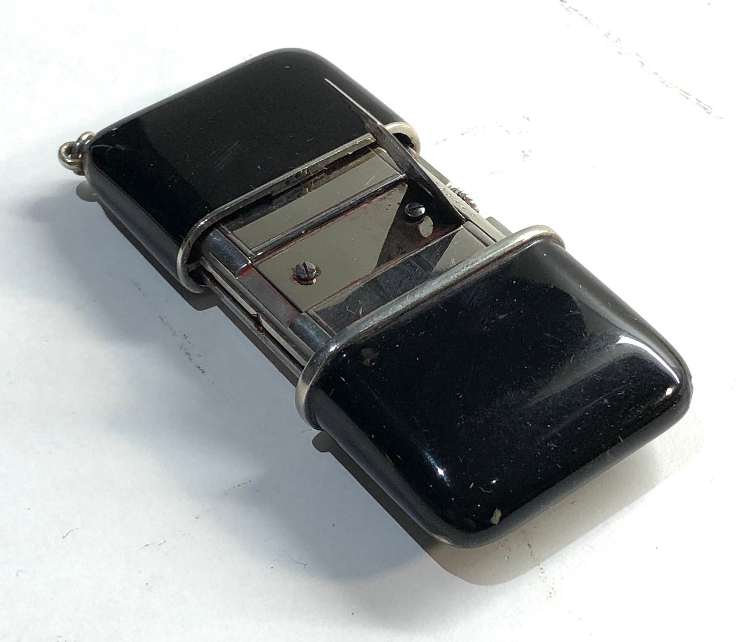 Black enamel Movado Ermeto purse watch in good overall condition edge chips to enamel - Bild 2 aus 4