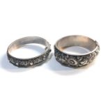 2 silver floral design bangles