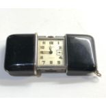 Black enamel Movado Ermeto purse watch in good overall condition edge chips to enamel