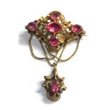 hi-carat gold gold foil back pink stone brooch measures approx 75mm drop 53mm wide not hallmarked