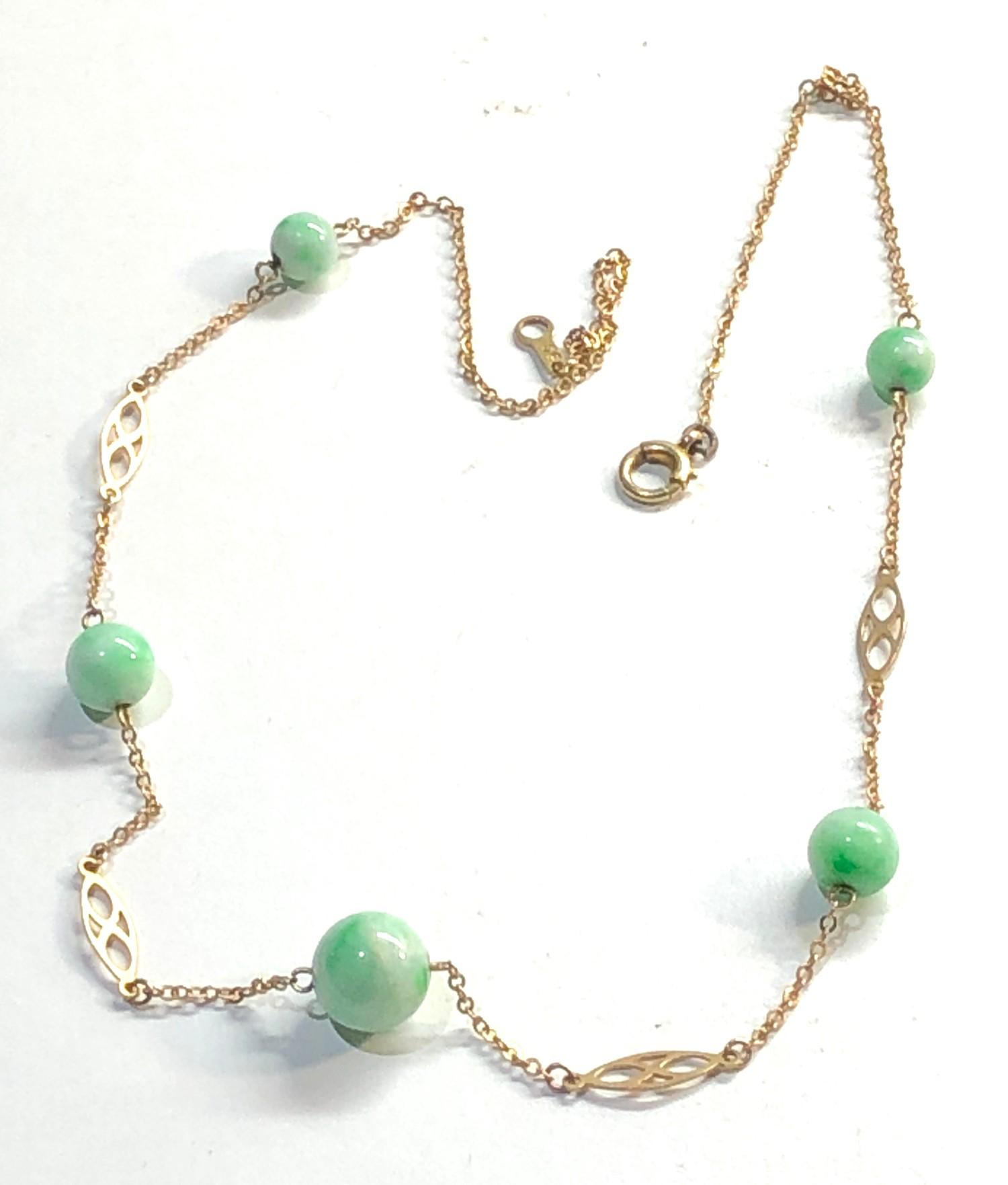 9ct gold jade necklace, overall good condition, largest jade bead measures approximately 9mm