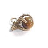 9ct Gold tigers eye eagle claw charm/ pendant, this piece is in good overall condition