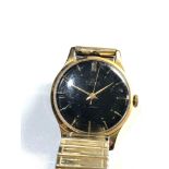Vintage black dial smiths de luxe 17 jewel gents wrist watch winds and ticks but no warranty given