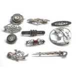 Selection of vintage silver brooches